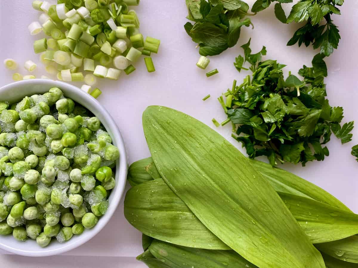 Fresh ramps, petite peas, scallions and herbs for the sauce.