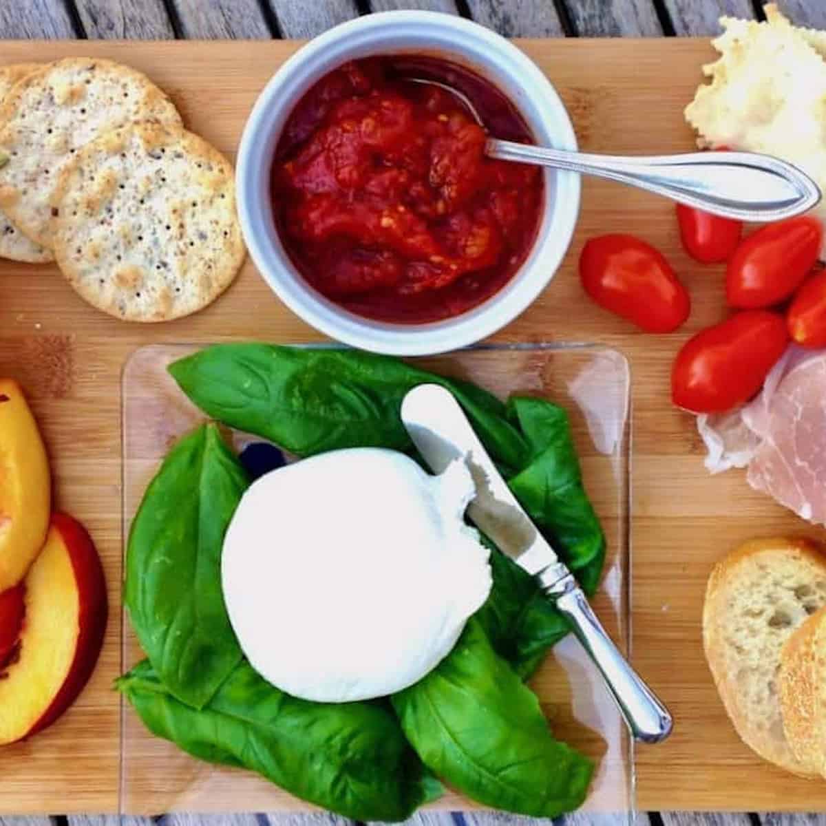 Life on the deck is delicious with fruit and cheese board.