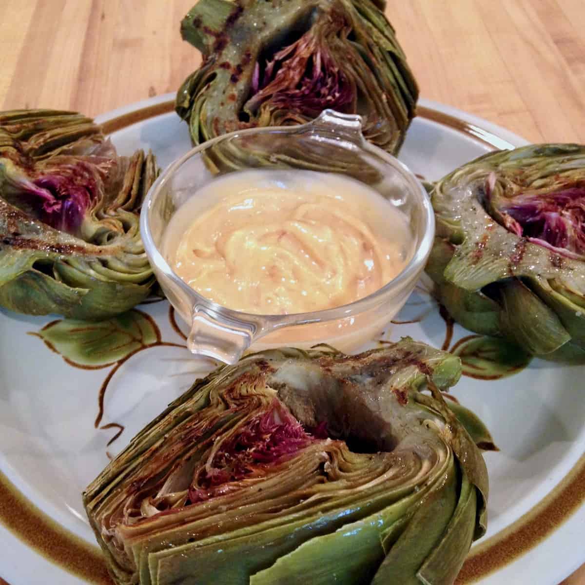 The heart of grilled artichokes and dip.