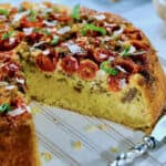 Sweet Yellow Cornbread, Sausage and Tomato Pie with a Garlic Cream Drizzle.