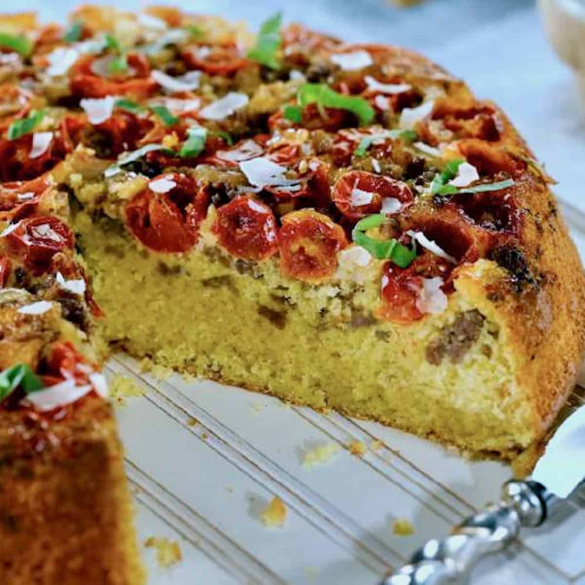 Sweet Yellow Cornbread, Sausage and Tomato Pie with a Garlic Cream Drizzle.