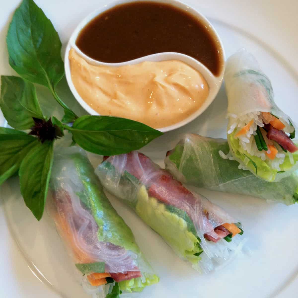 Duck bacon spring rolls.