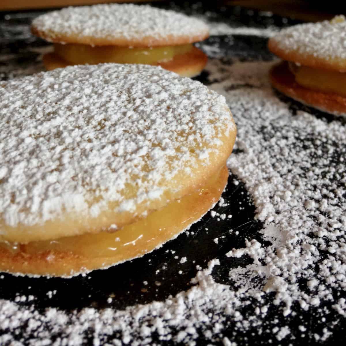 Freshest corn whoopie pies filled with lemon curd and dusted with powdered sugar.