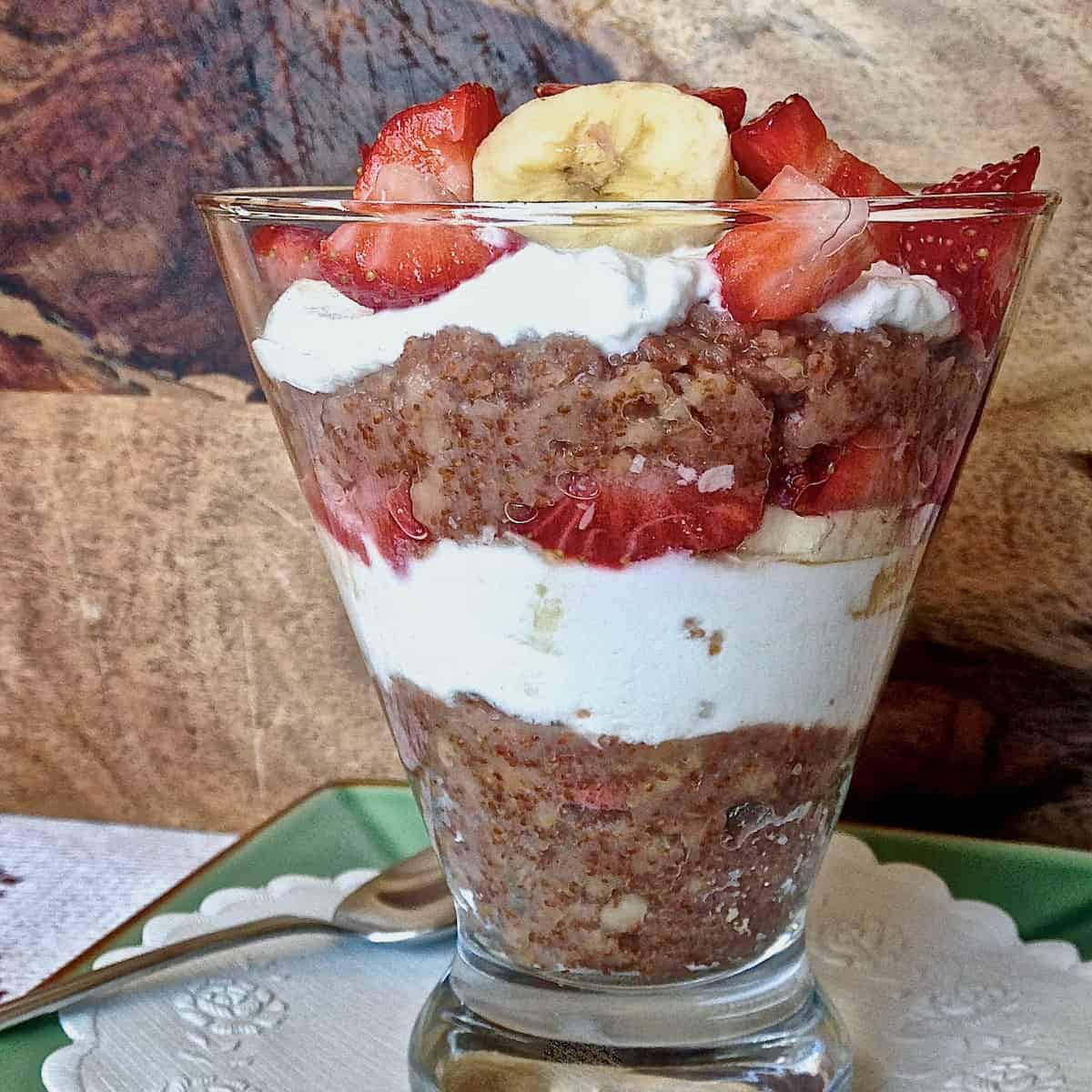 Toasted teff and oats breakfast parfait.