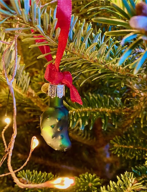 Pickle ornament on Christmas tree.