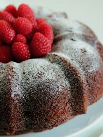 Chocolate bundt cake with raspberries.