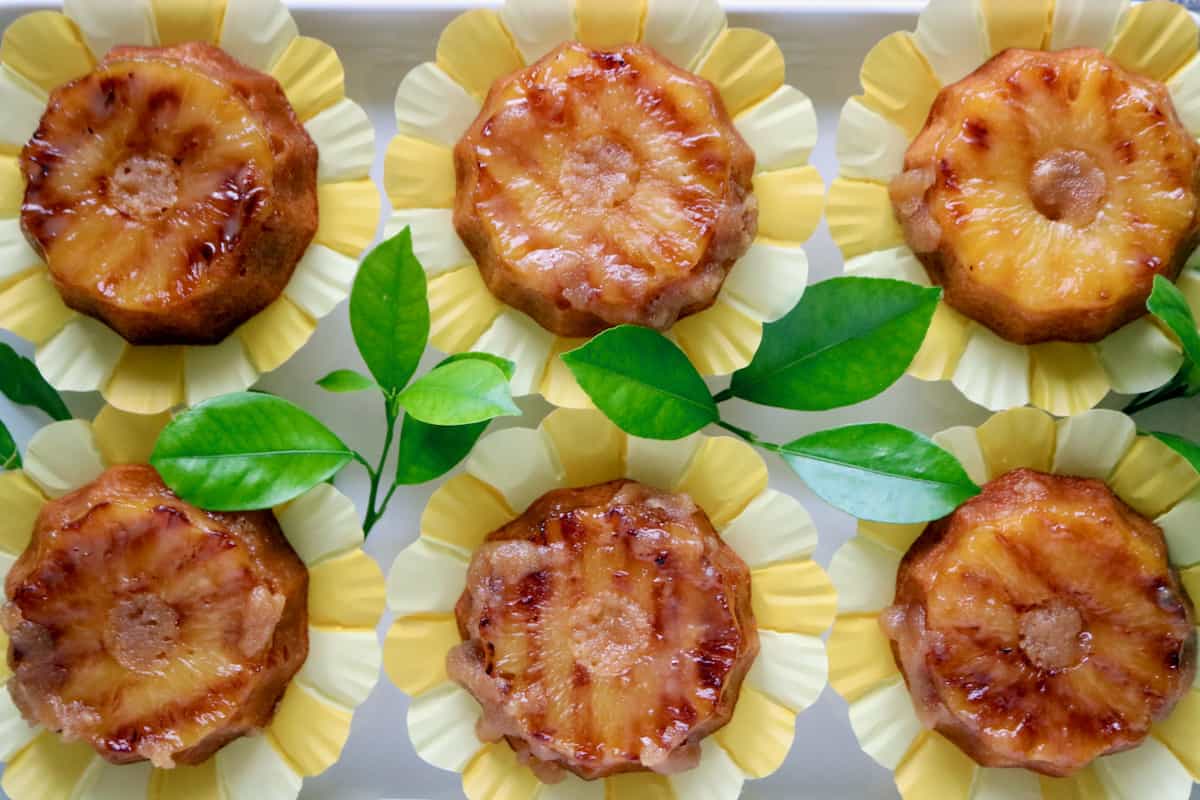 Mini pineapple upside down cakes.