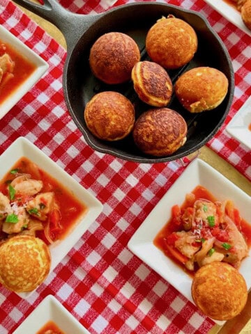 Easy chicken cacciatore with cornbread cheese puffs.