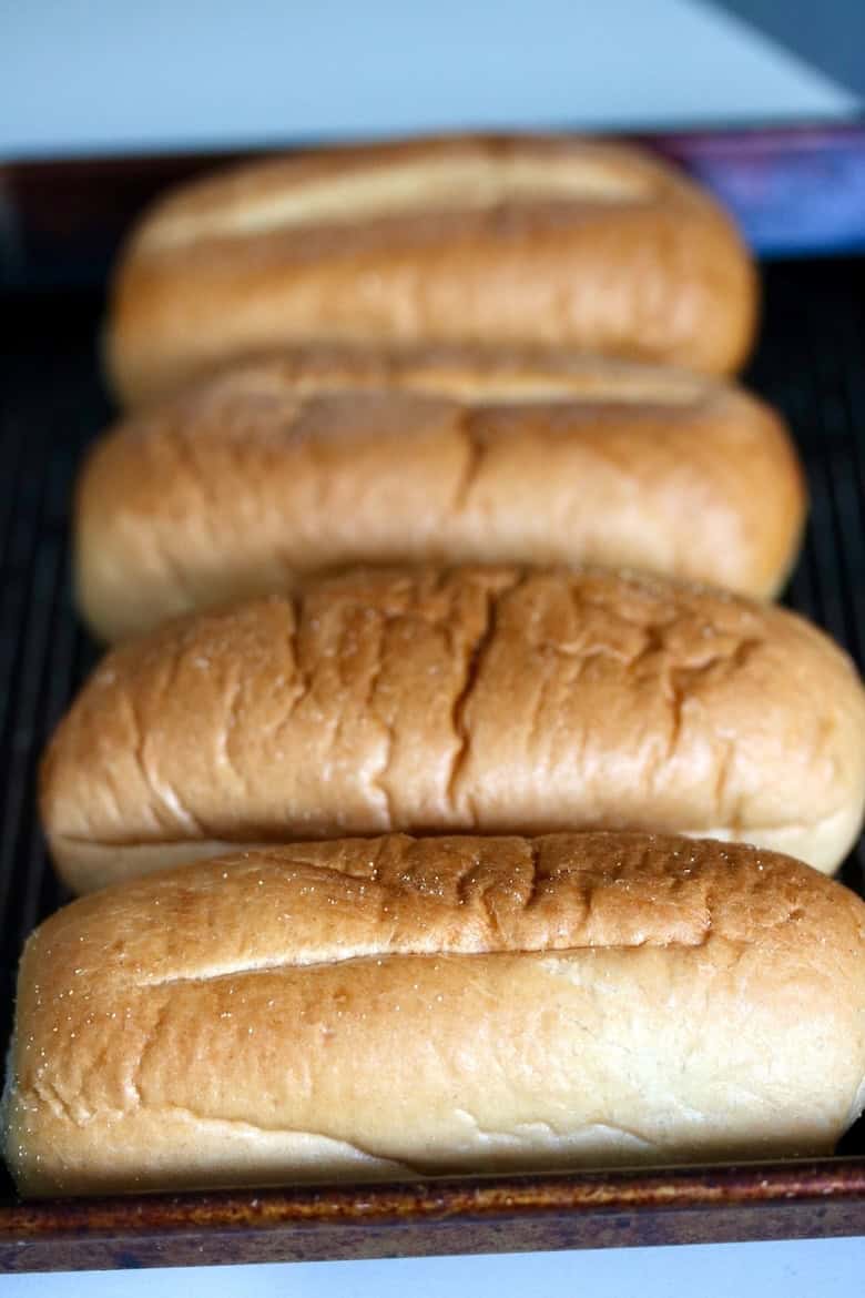 Toasting club rolls.