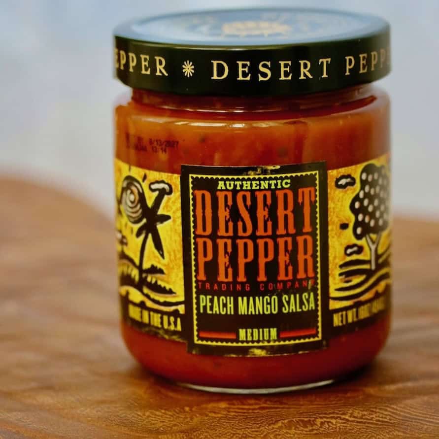 Jar of peach mango salsa.