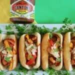 Mexican inspired oven roasted sausage and peppers with jar of salsa.
