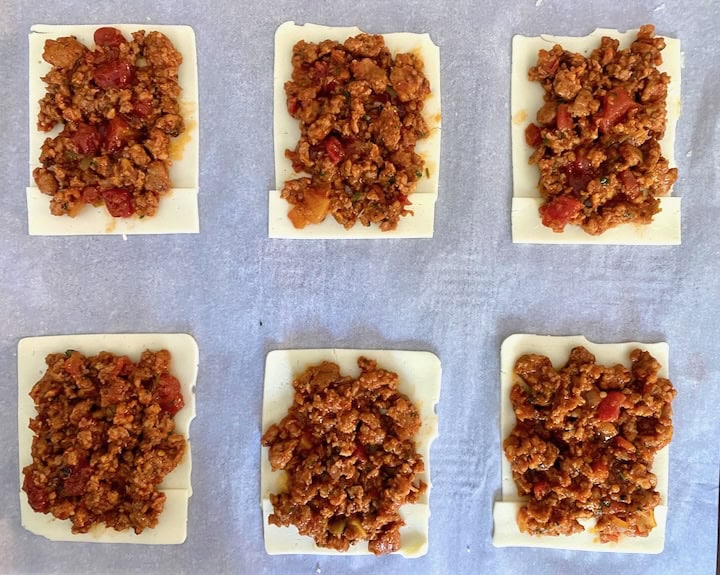 Layer of cheese and then filling.