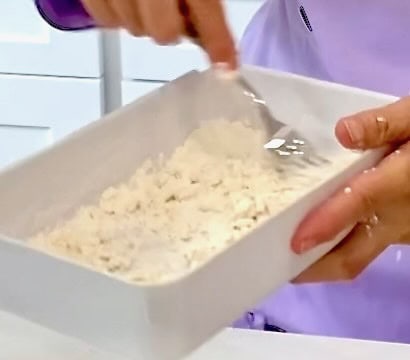 Clumps of chicken coating.