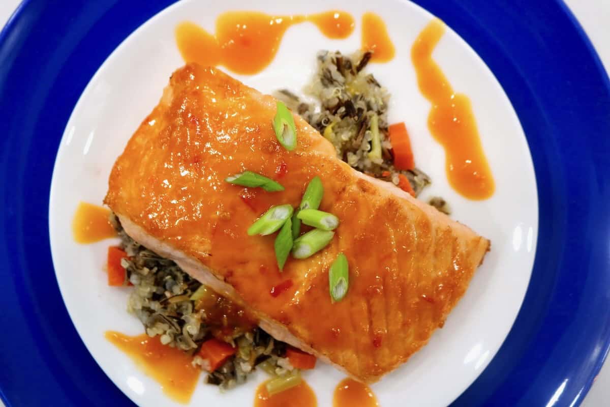 Virus seared salmon with wild rice pilaf.