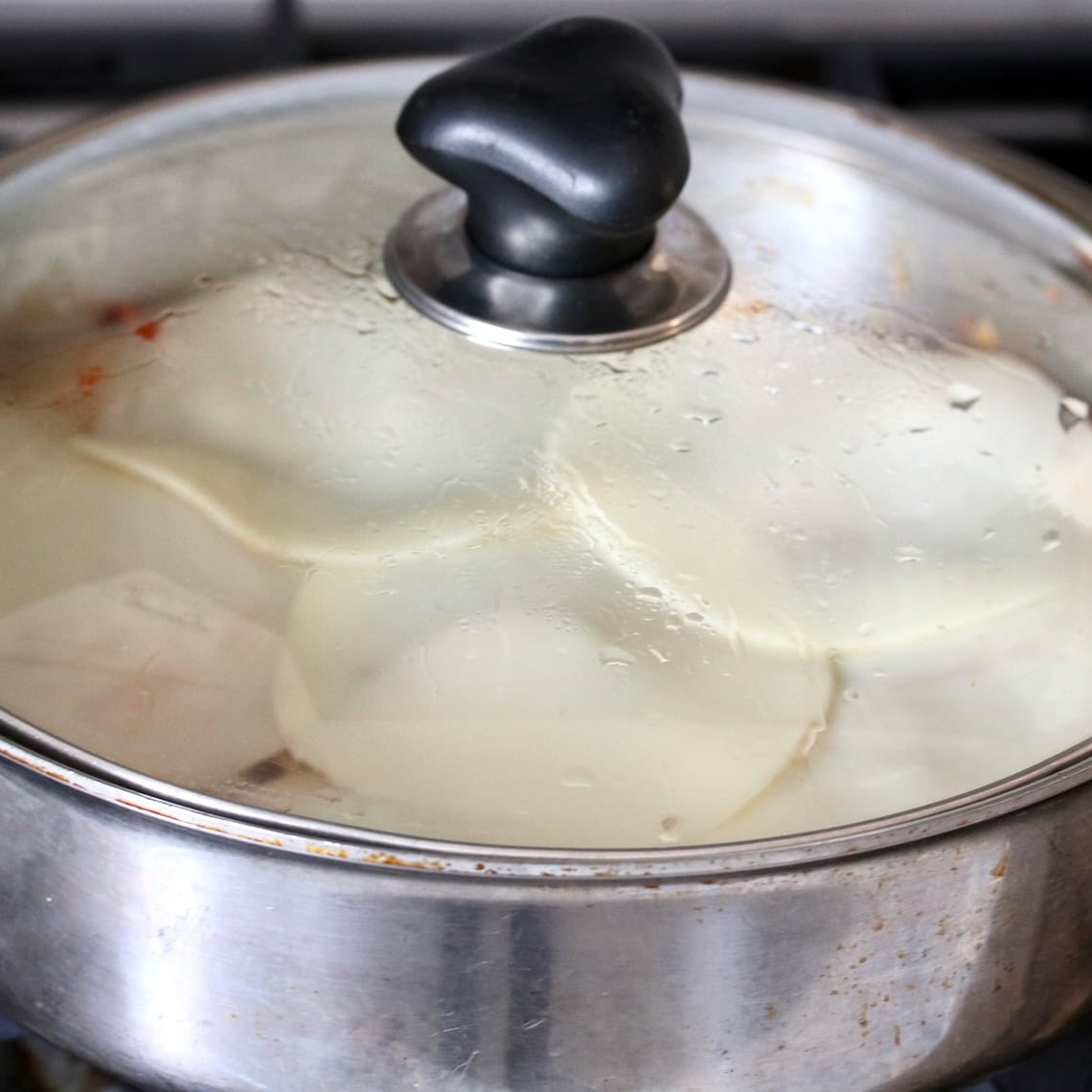 Melting the cheese.