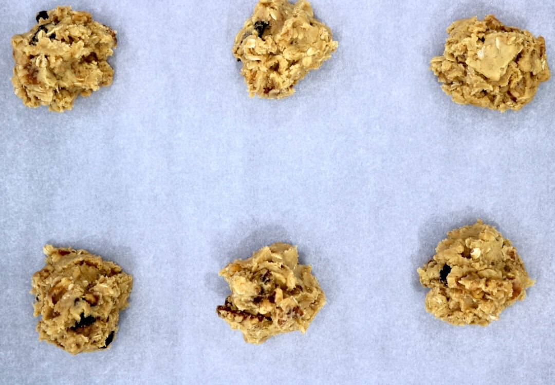 Three ounce portions of cookie dough.
