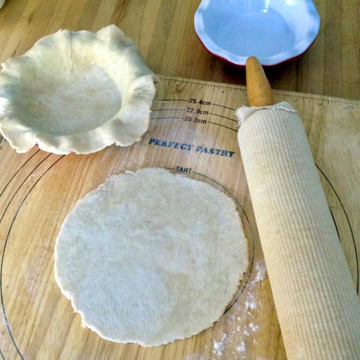 Rolling dough for sour cherry pie.
