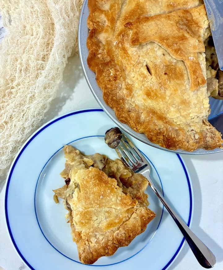 Slice of beef and mushroom pot pie.