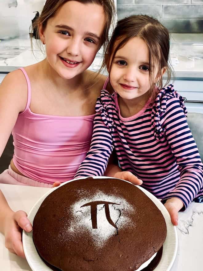 My granddaughters showing a large whoopie pie.