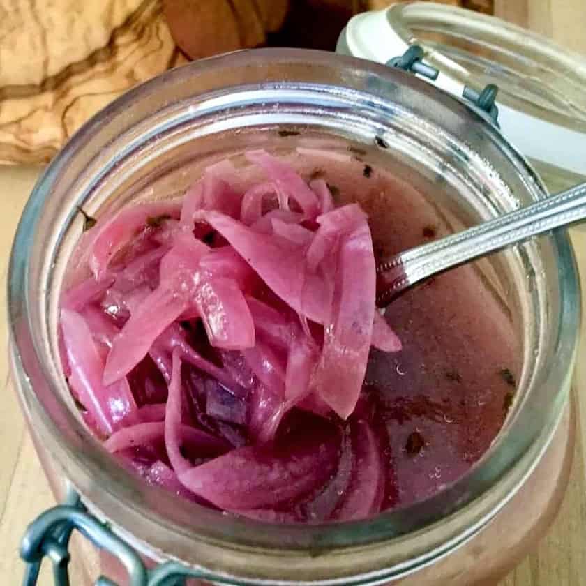 Jar of pickled red onions.