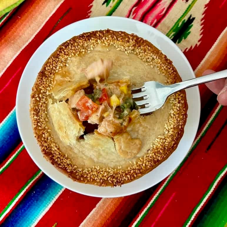 Delicious homemade chicken pot pie with golden crust and savory filling.