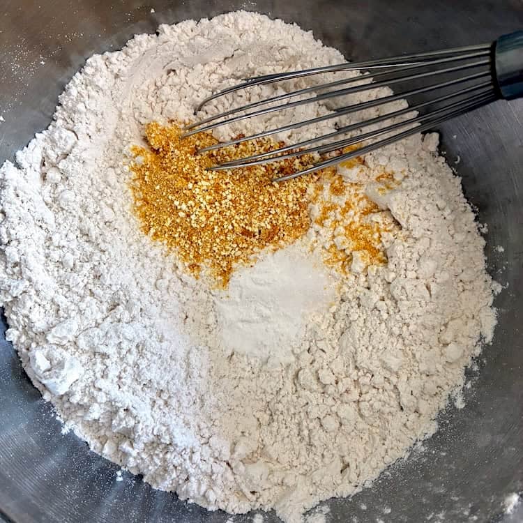 Whisking dry ingredients.