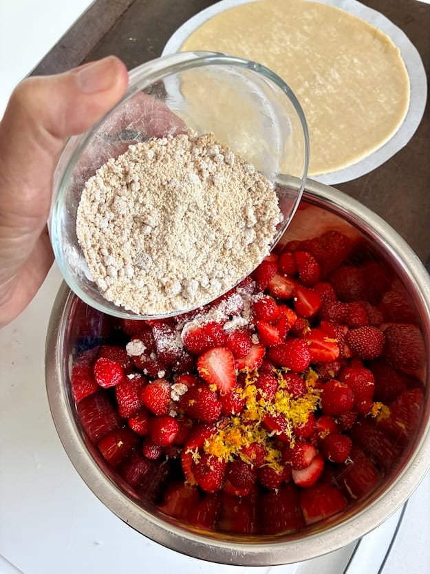 Mixing galette filing ingredients.