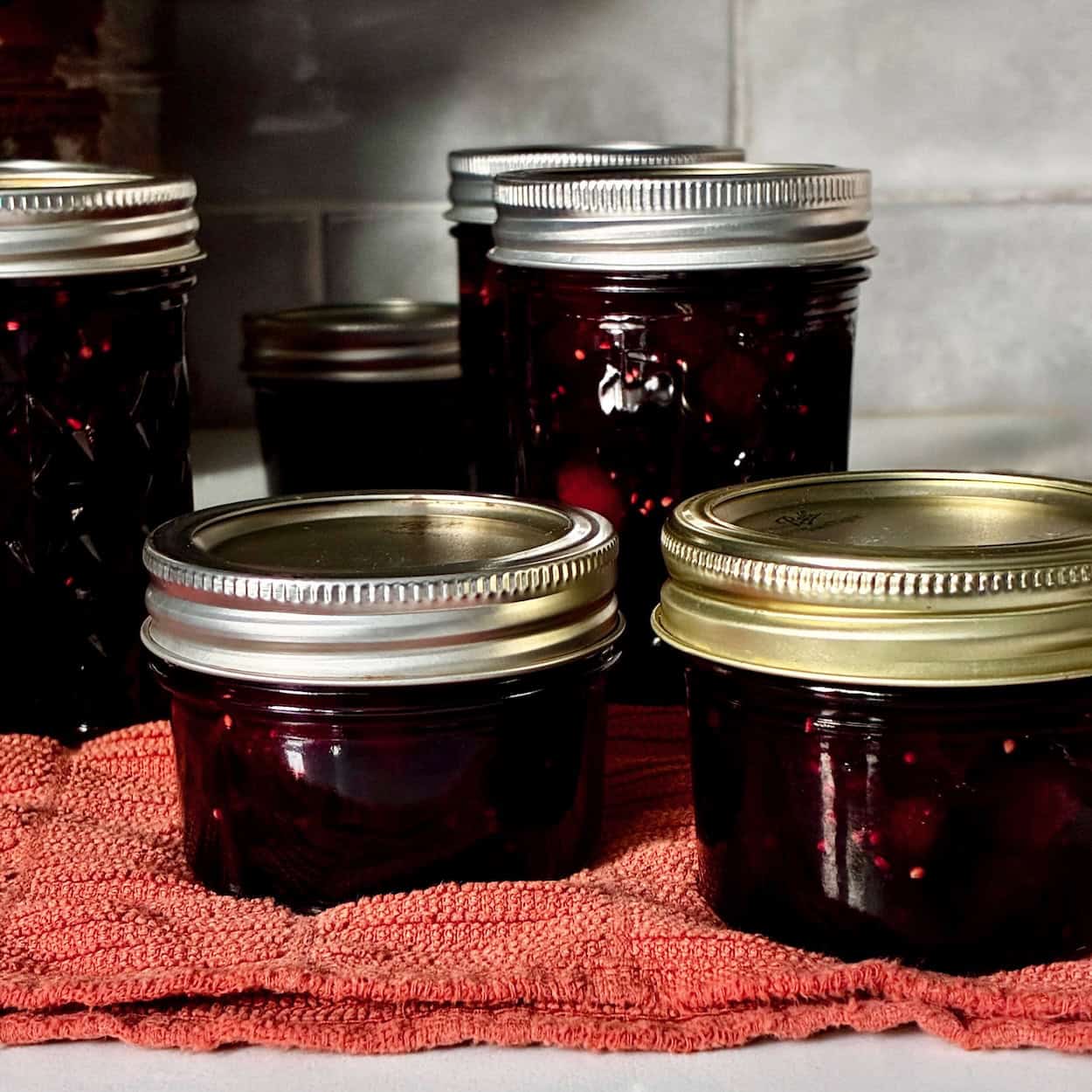 Mulberry jam filled jars.