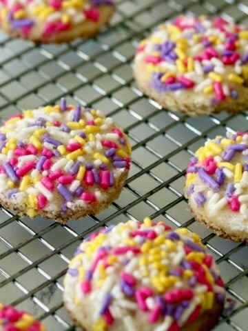 Funfetti cookies on a cooling rack.