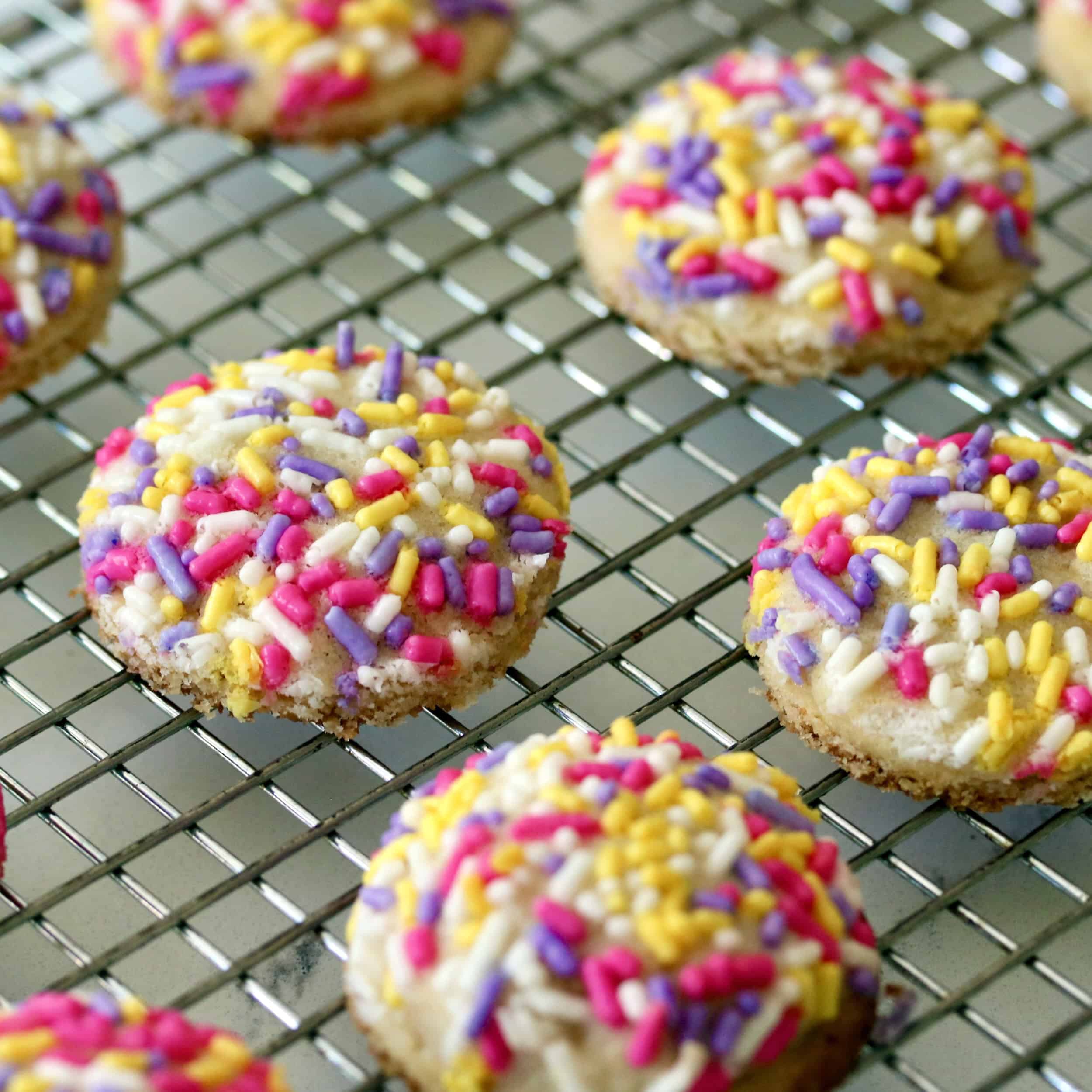 Funfetti cookies on cooling rack.