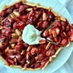 Strawberry rhubarb galette with cream.