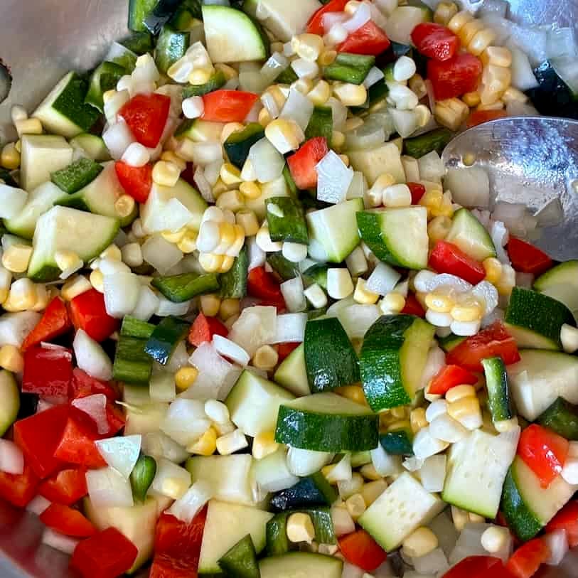 Cooking vegetables for Mexican chicken pot pie.