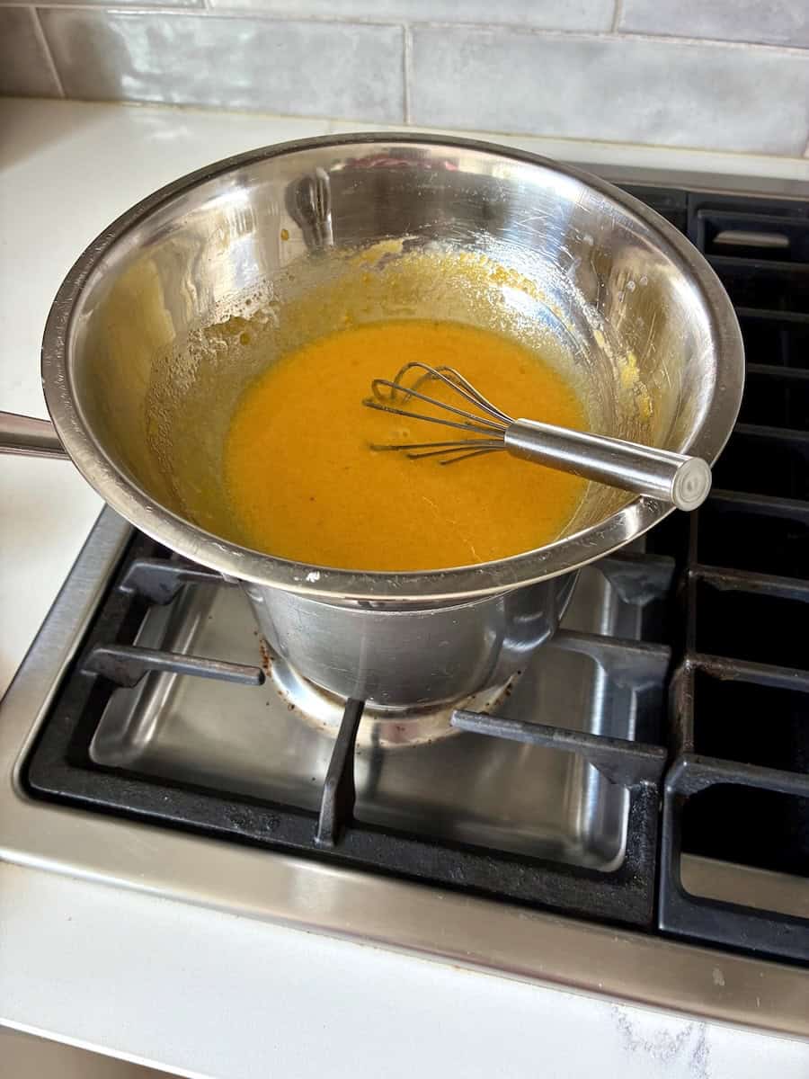 Bain marie set up for cooking the custard.