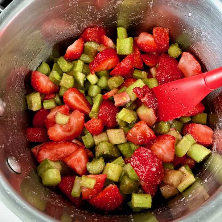 Making strawberry and rhubarb compote.