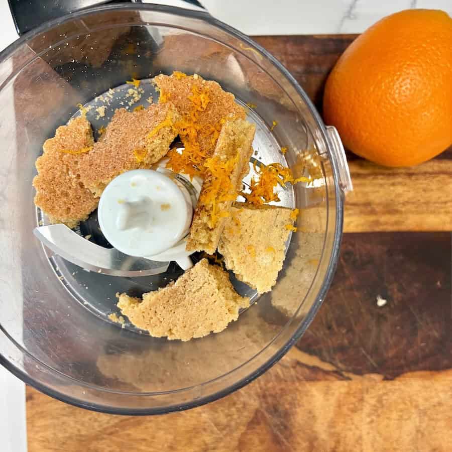 Making orange crumb topping in a food processor.