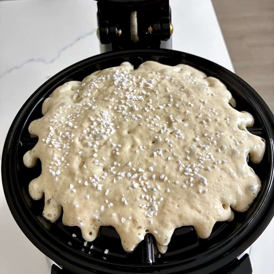 Pearl sugar on sourdough waffle batter.