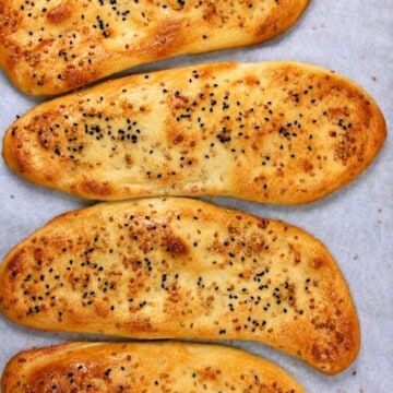 Naan bread with sesame and nigella seeds.