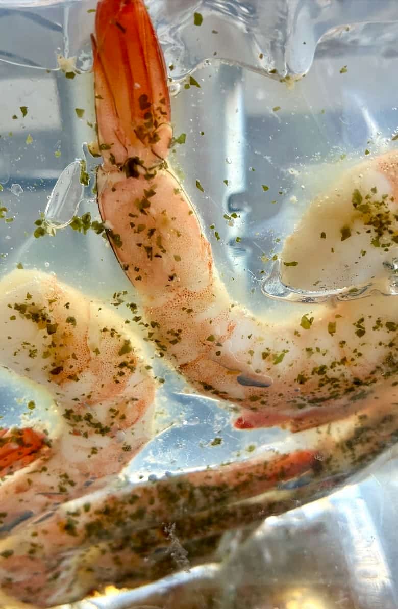 Cooking shrimp in a temperature controlled water bath.